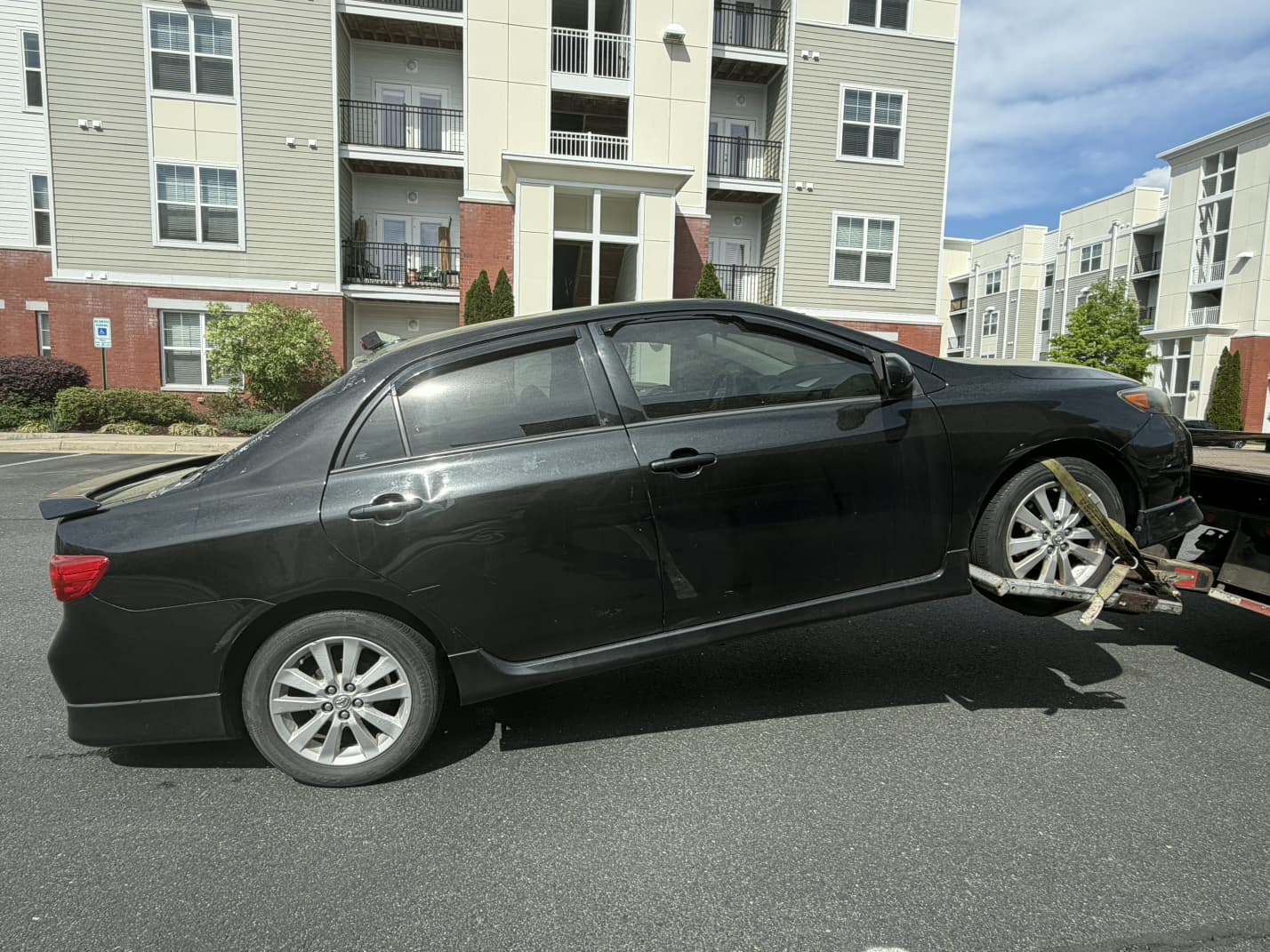 Vehicle pickup from a Northern Virginia apartment complex by Dalo