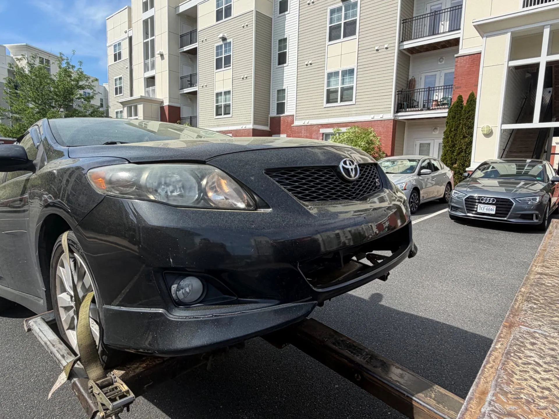 Commuter sedan being picked up from an apartment complex in Northern Virginia
