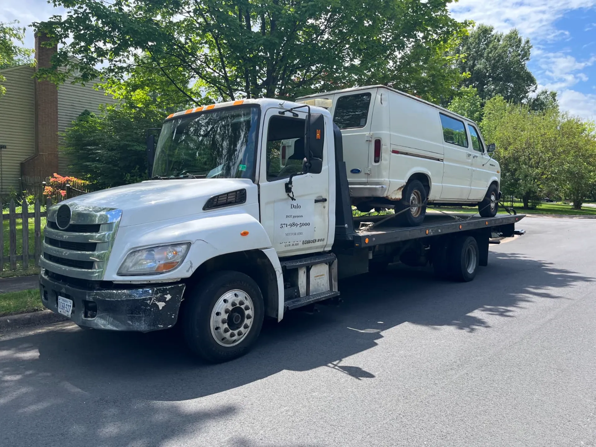 Older work van loaded for junk car removal in Springfield, VA